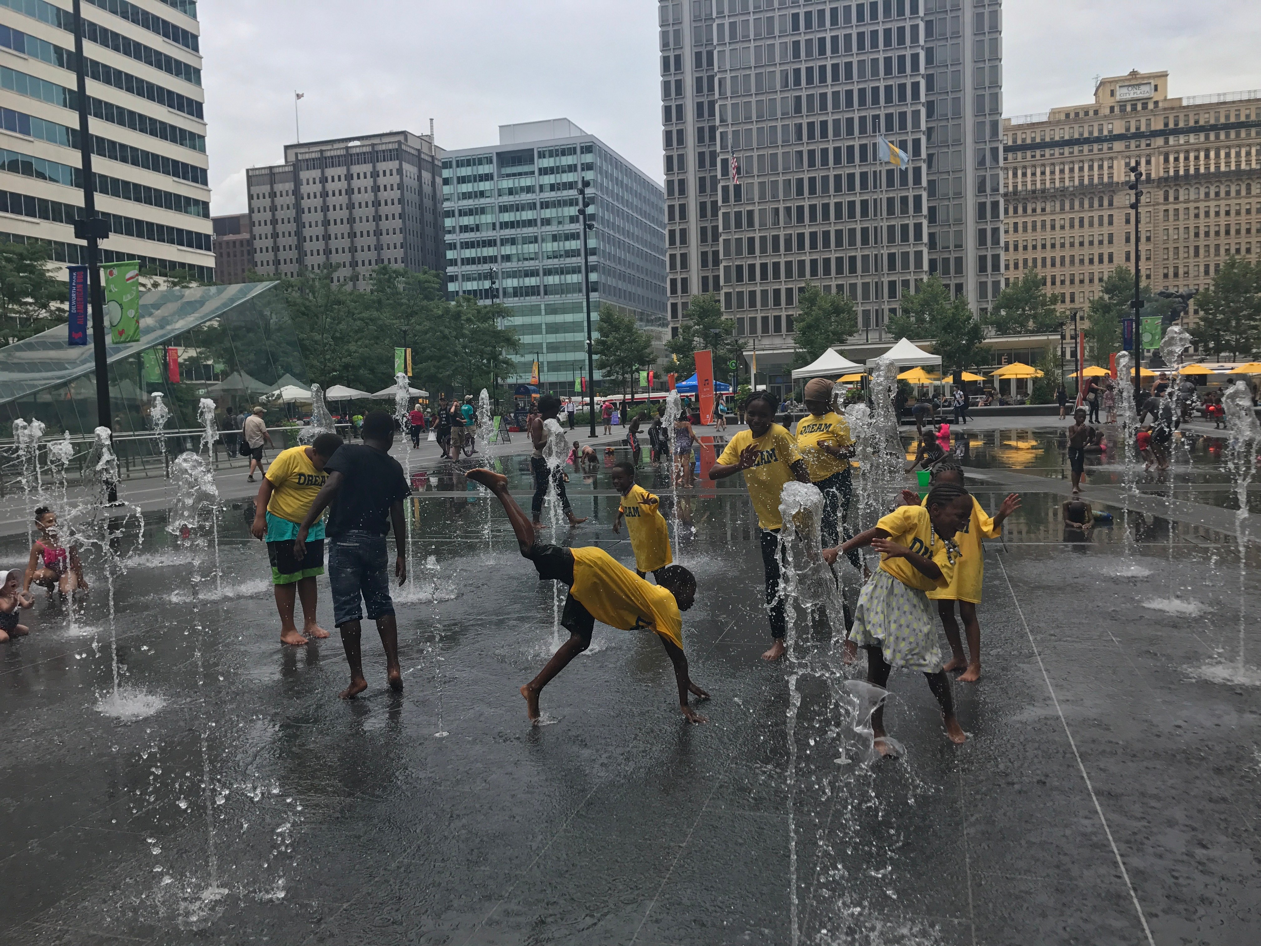 Youth in DREAM program enjoy a city splash pad.